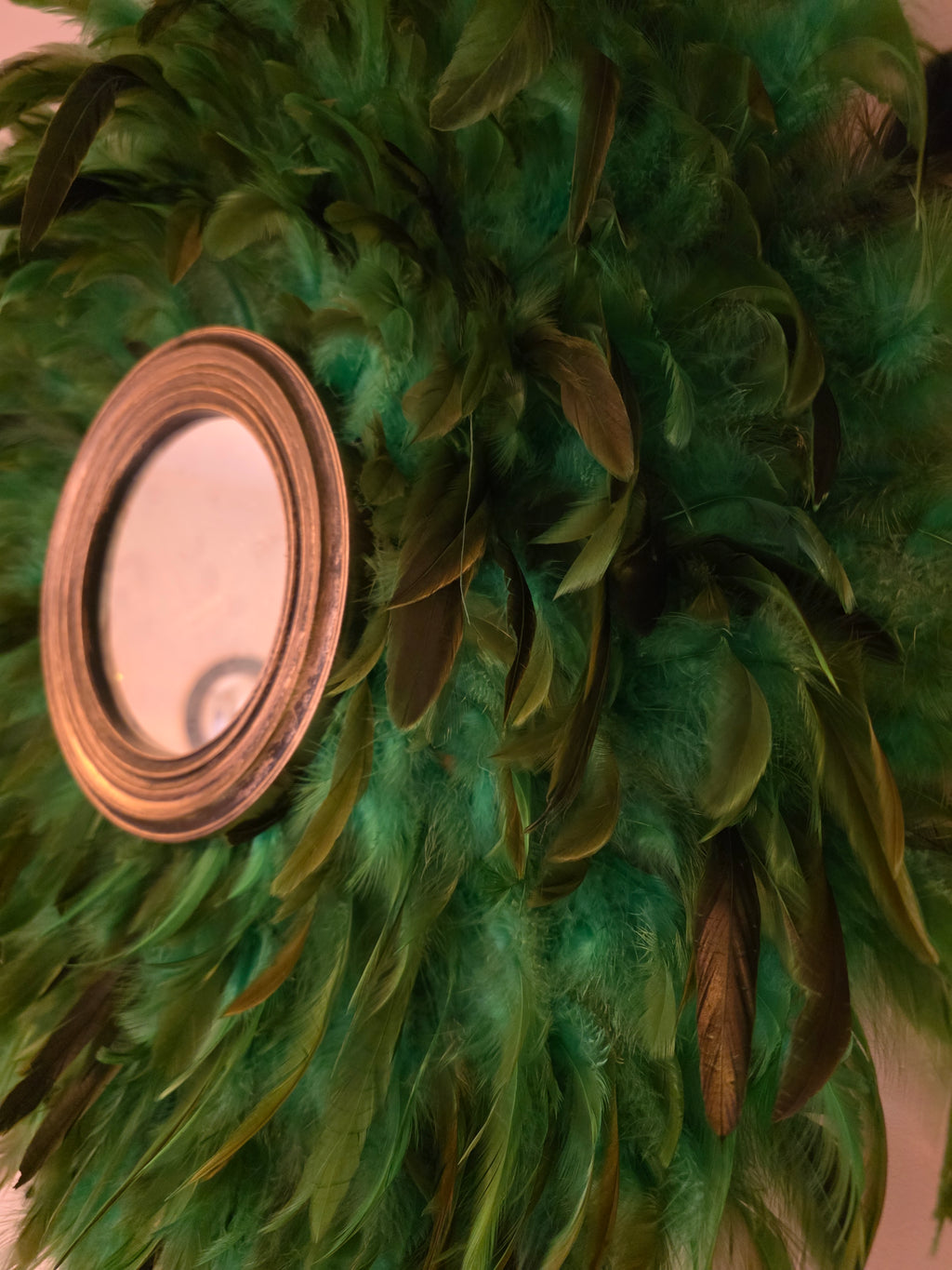 Green handmade feathered mirror