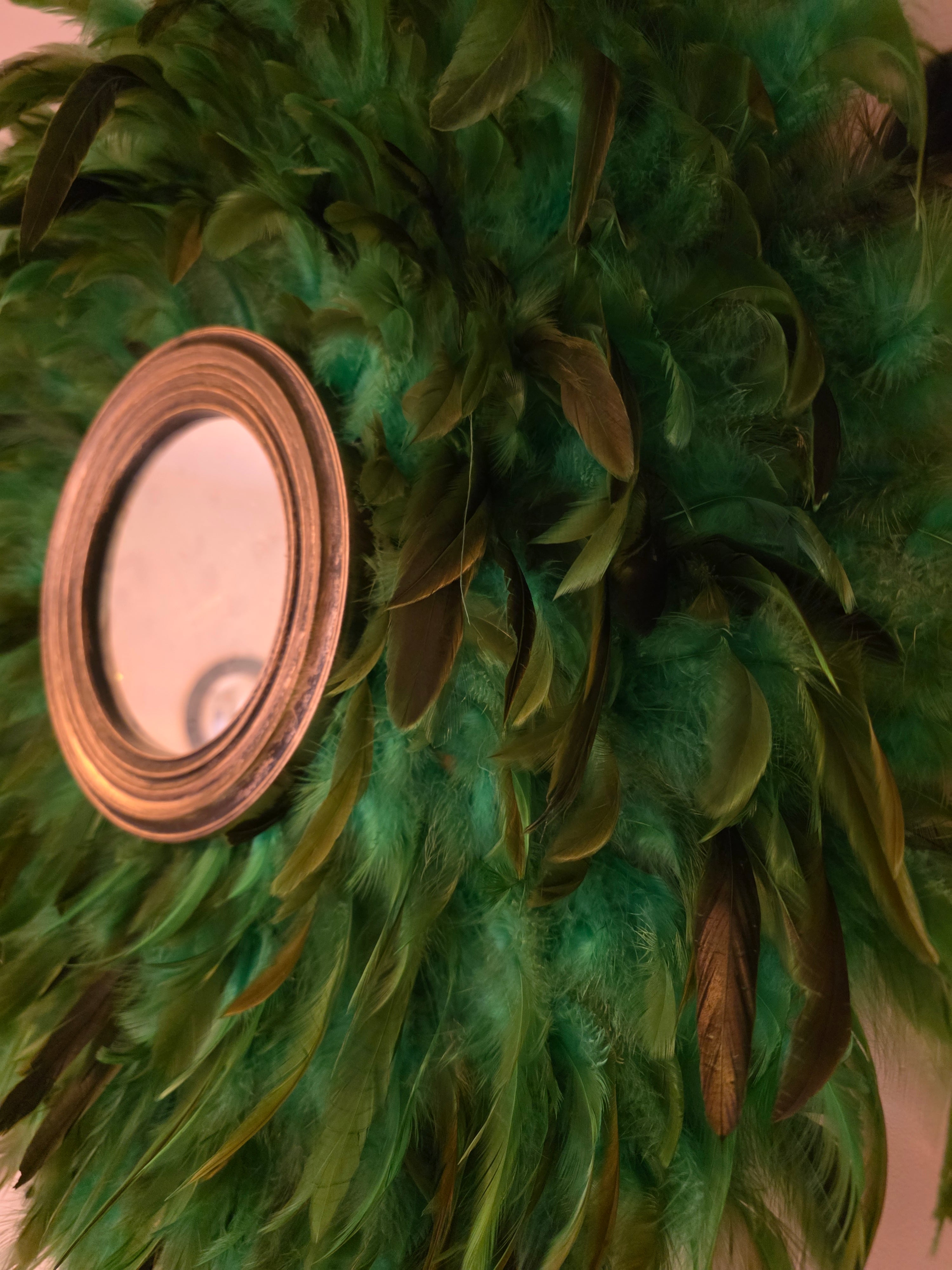 Green handmade feathered mirror