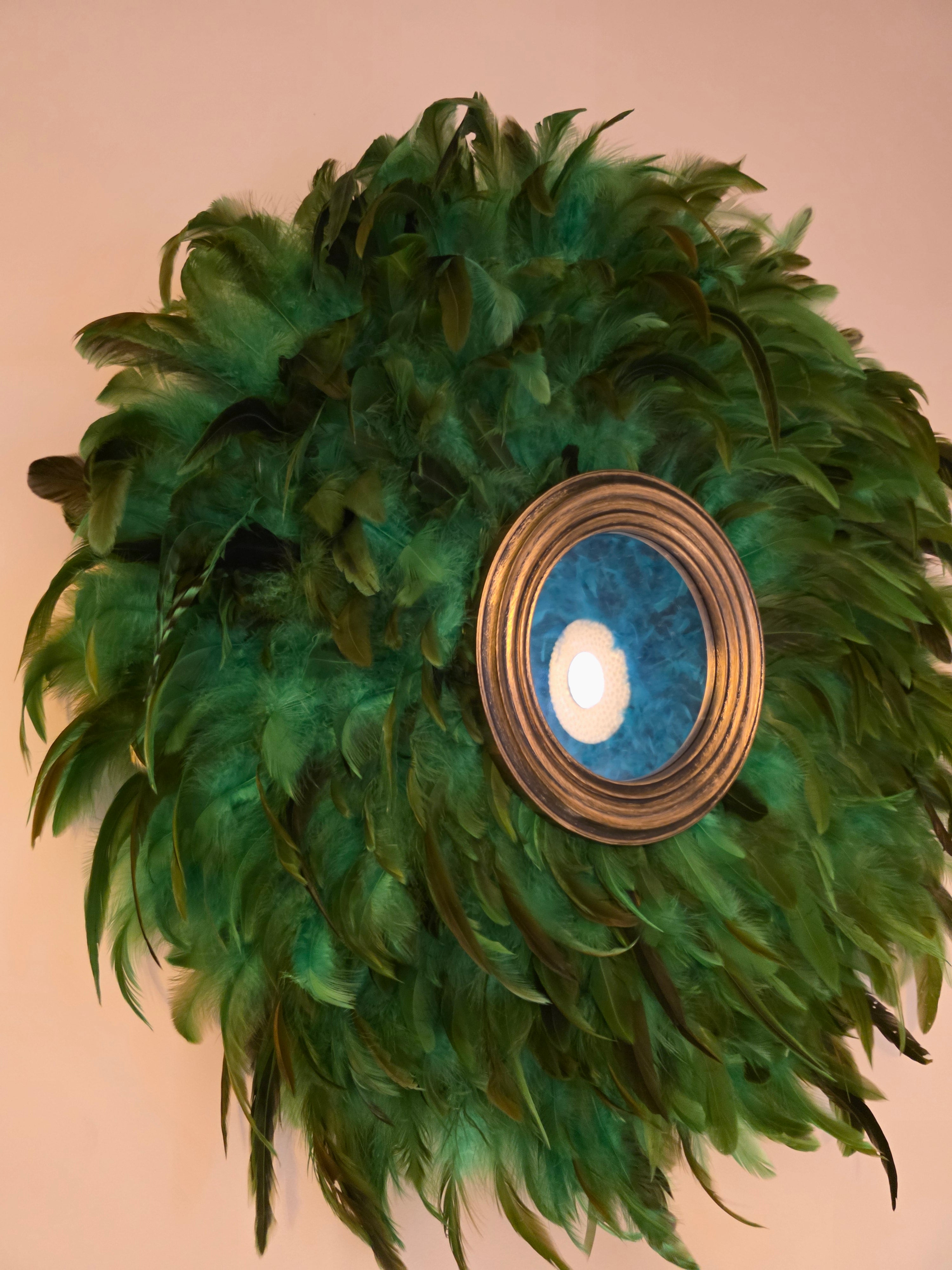Green handmade feathered mirror