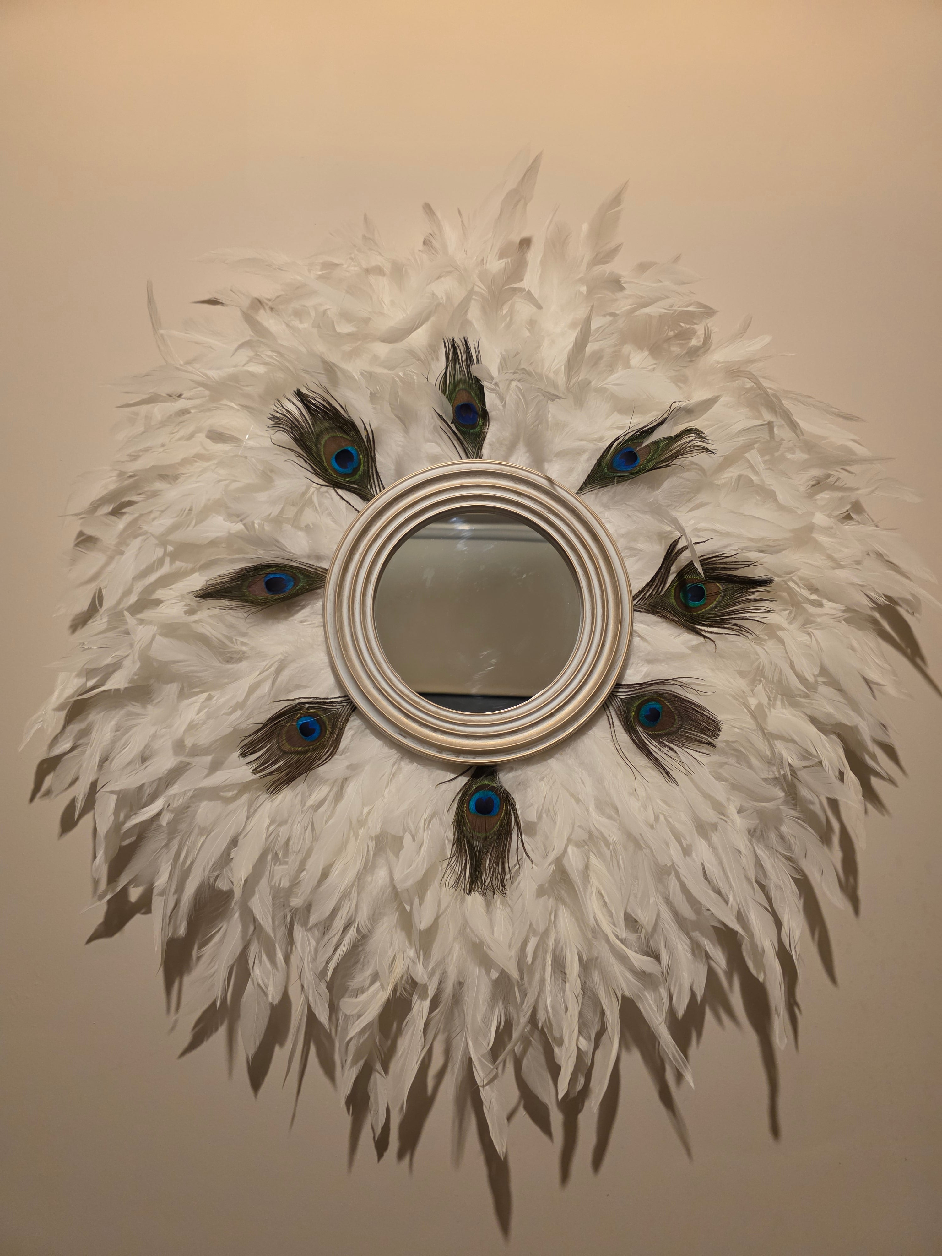 White handmade feathered mirror