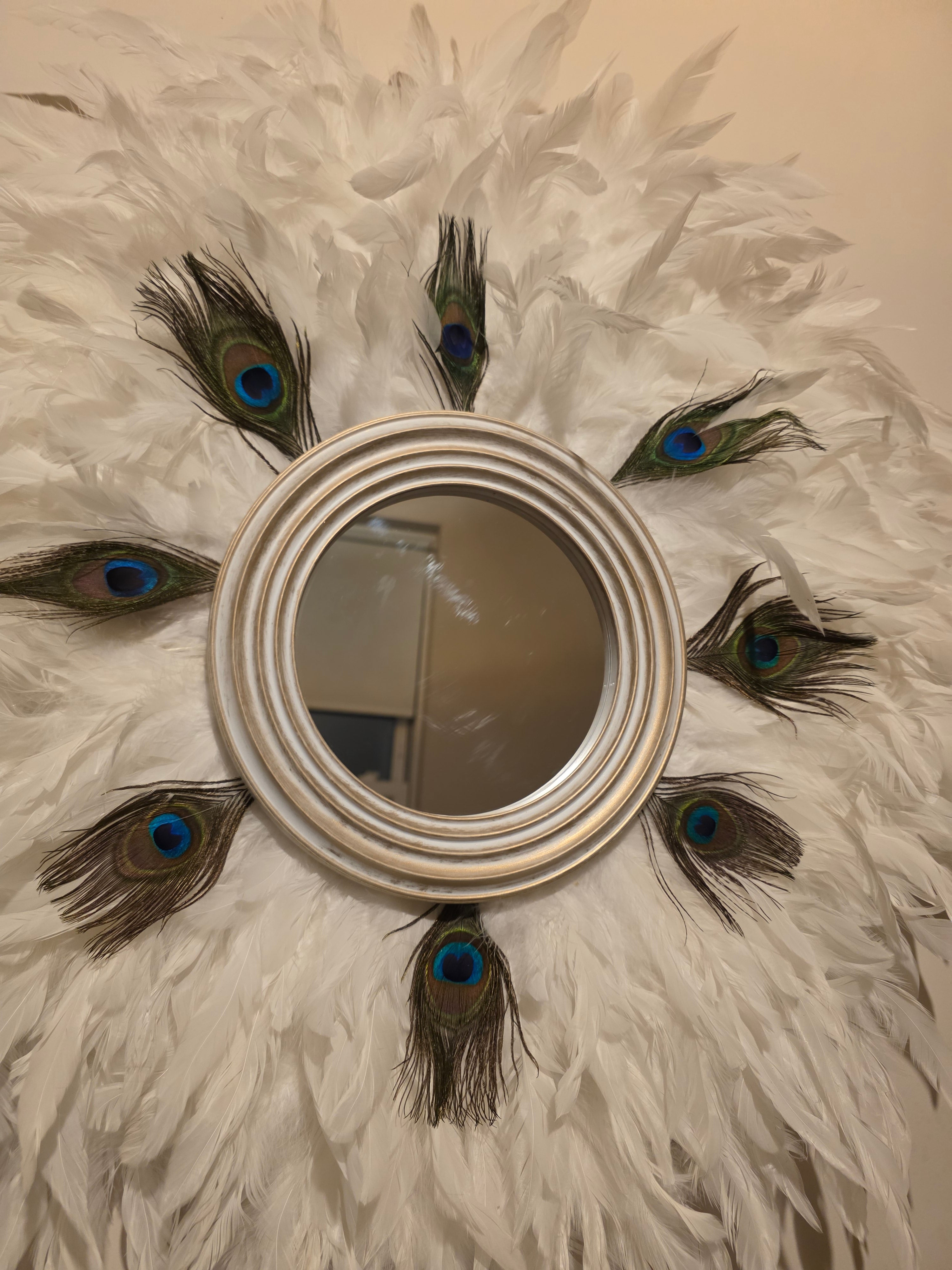 White handmade feathered mirror