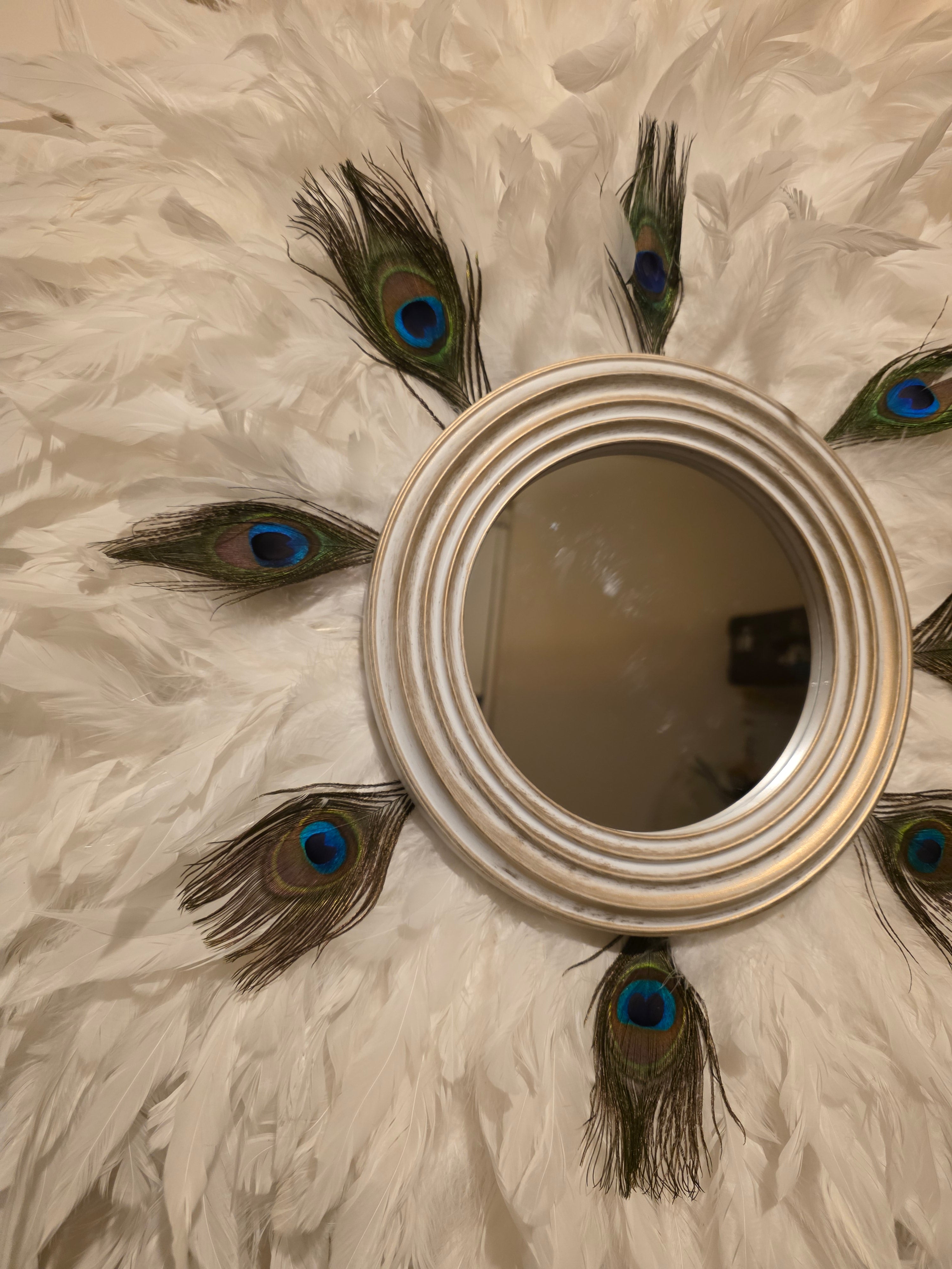 White handmade feathered mirror