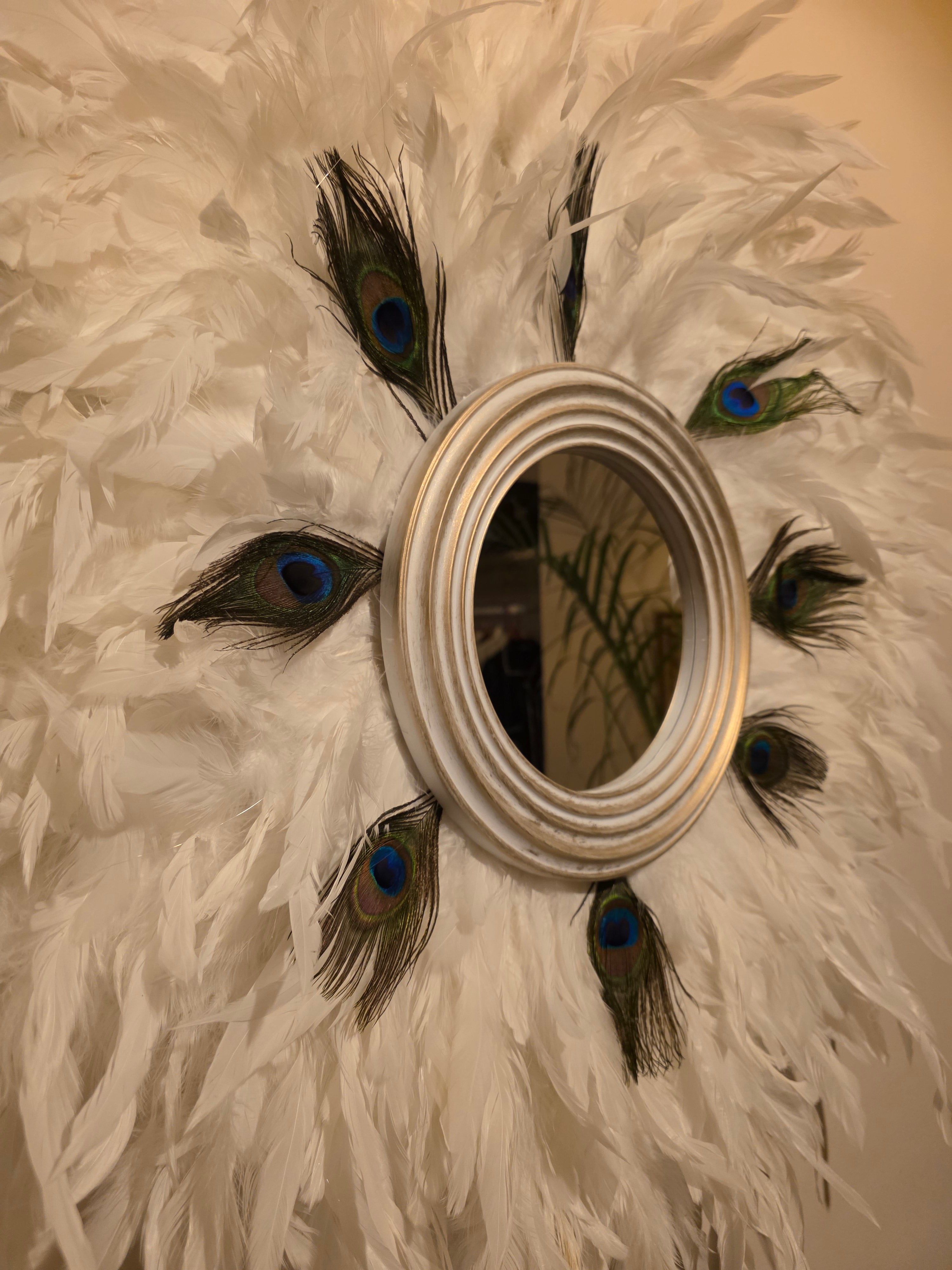 White handmade feathered mirror