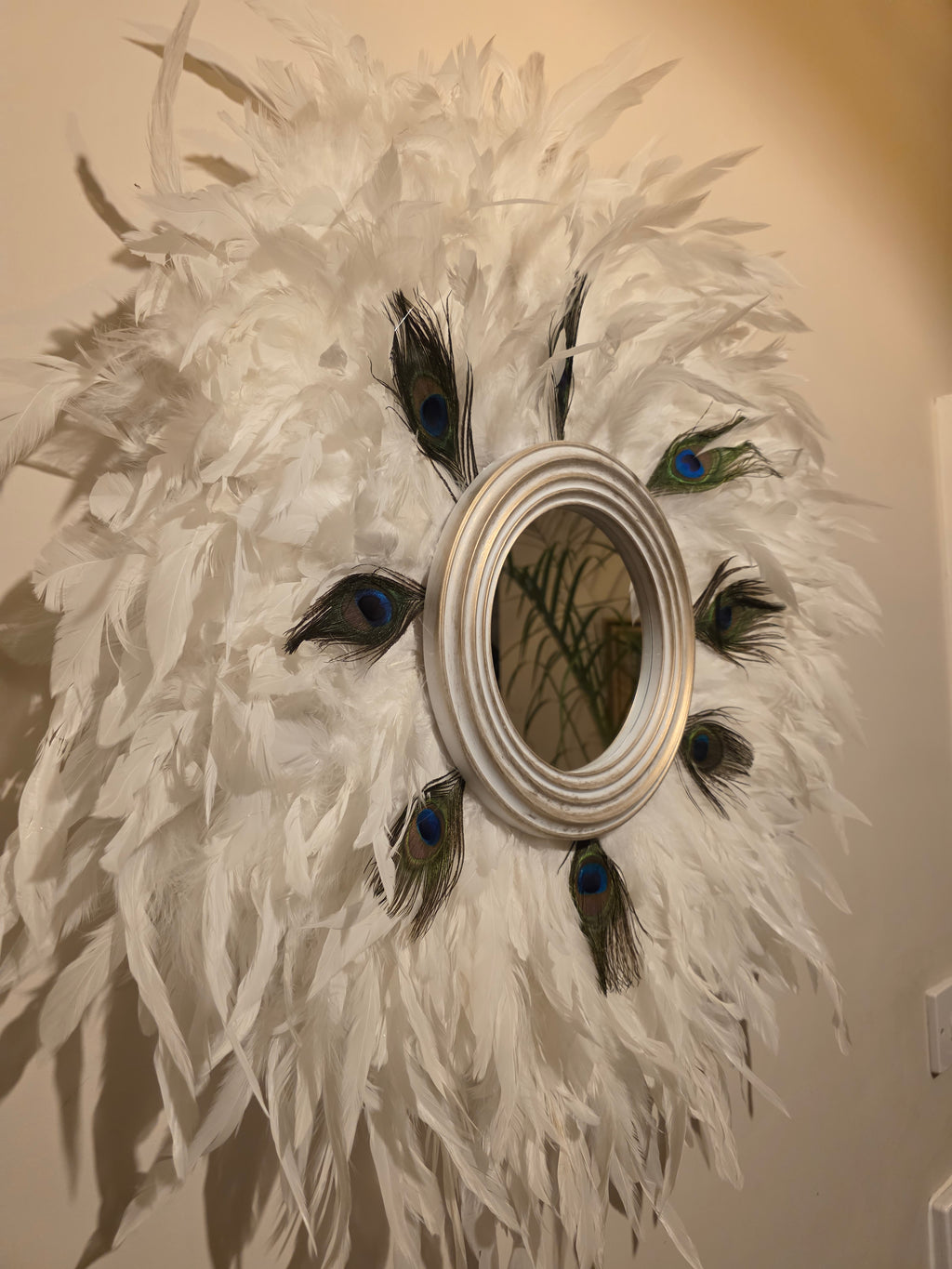 White handmade feathered mirror
