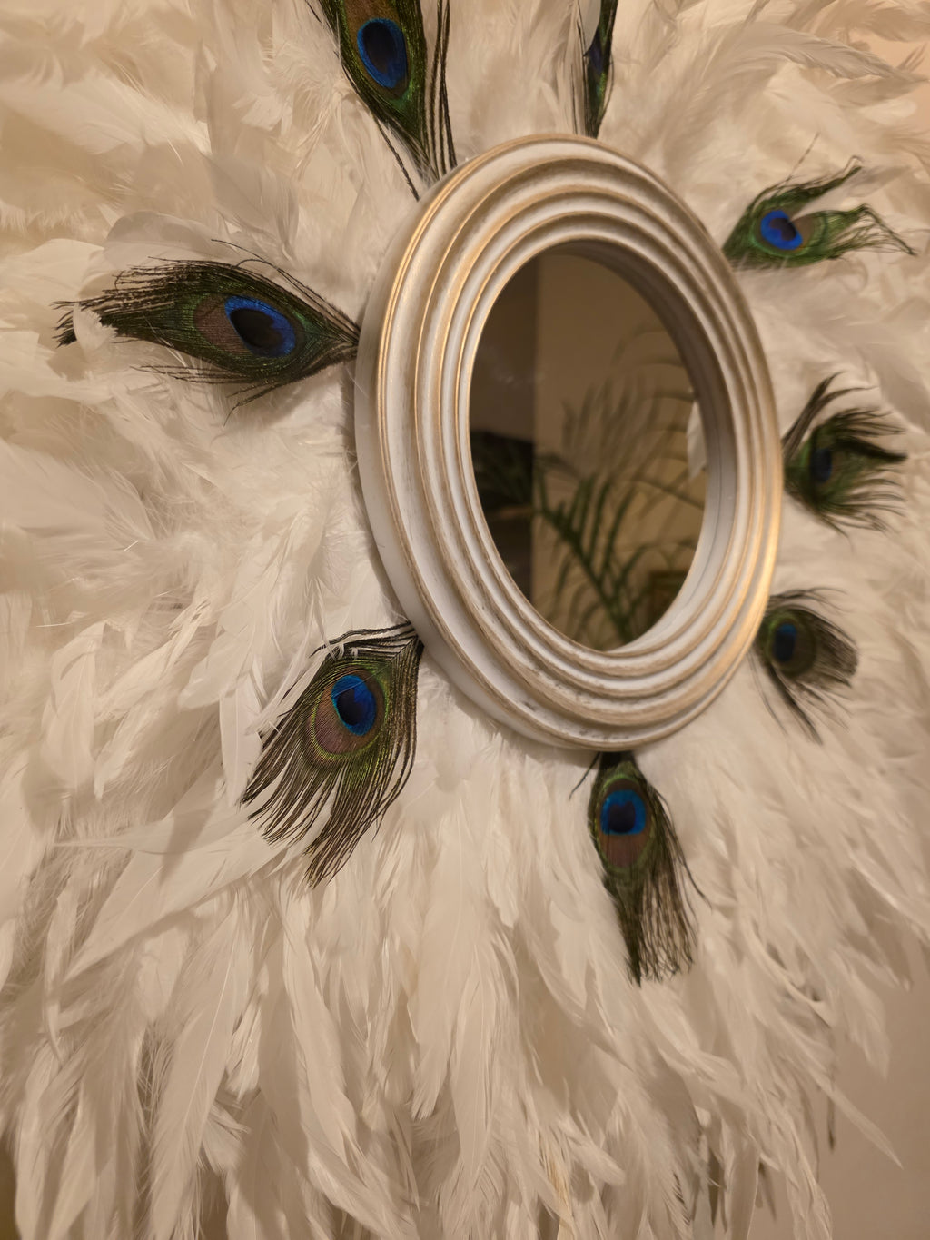 White handmade feathered mirror