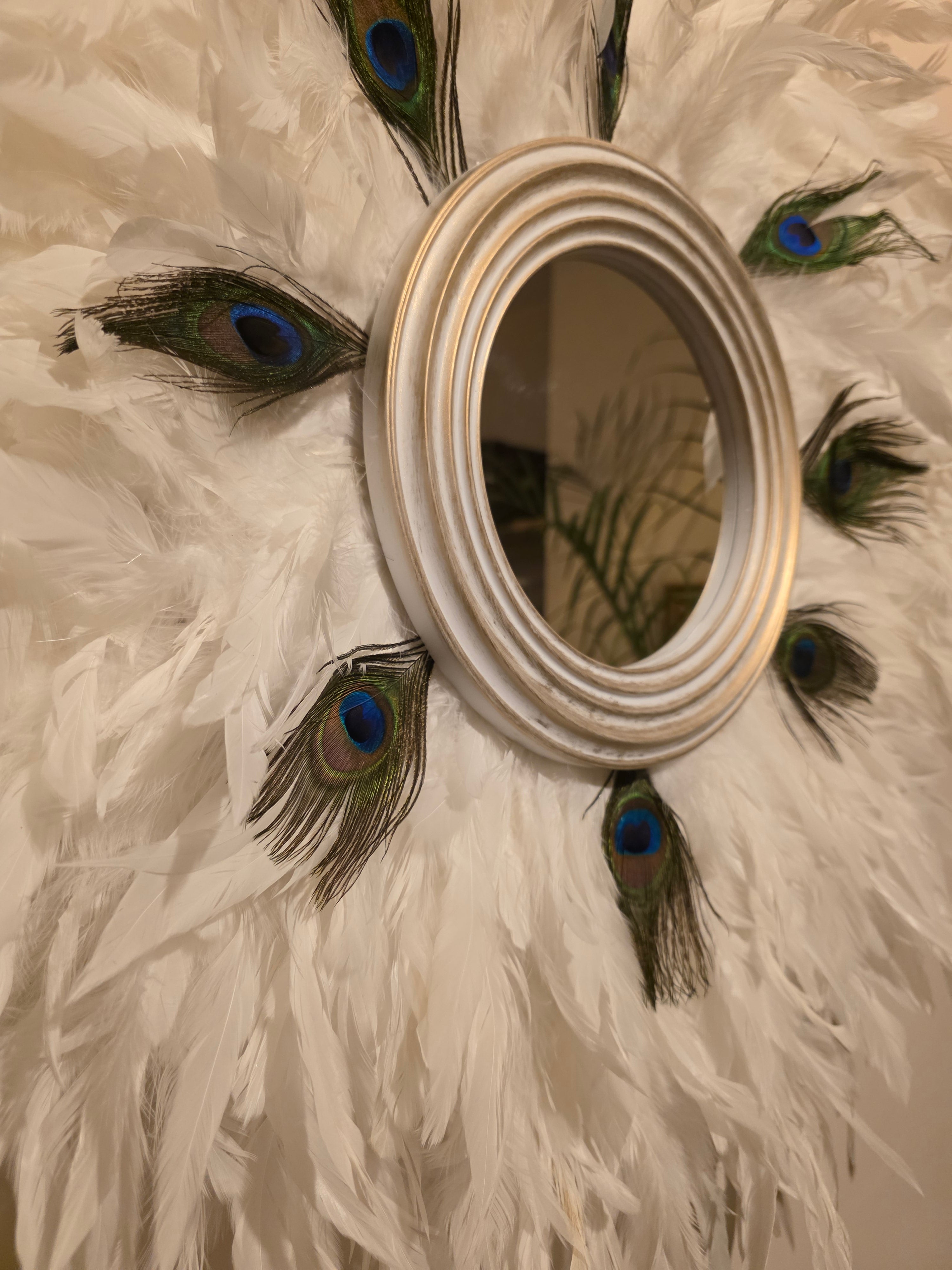 White handmade feathered mirror